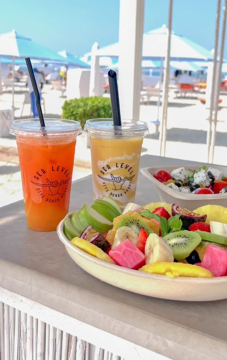 Fresh fruit and smoothies on a Sole Mio beach table