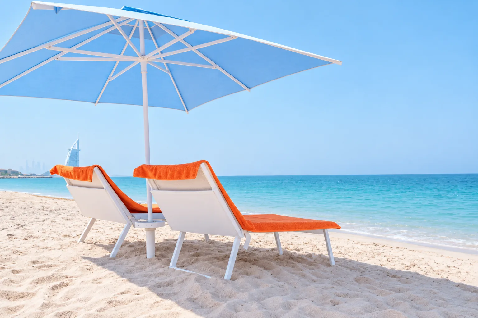 VIP Sole Mio lounger and blue beach umbrella